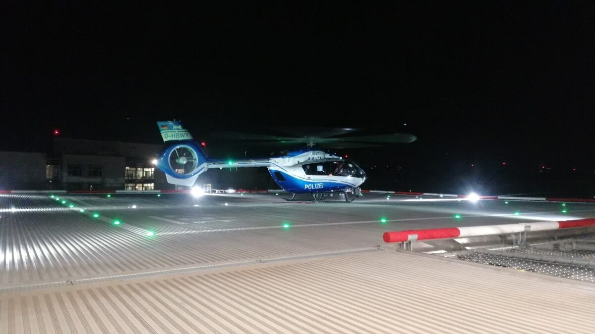 Helicopter from Police force landed on a helipad